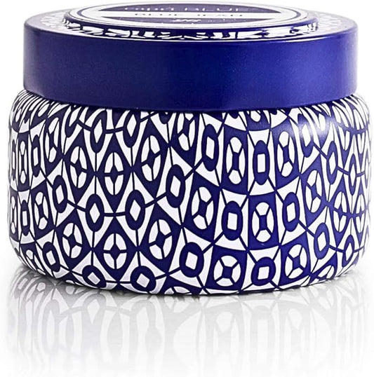 Capri Blue Printed Travel Tin Jar - Luxury Candle with a Soy Wax Blend - Scented Candles for Home with Notes of Citrus, White Musk & Patchouli (Blue Jean, 8.5 oz)
