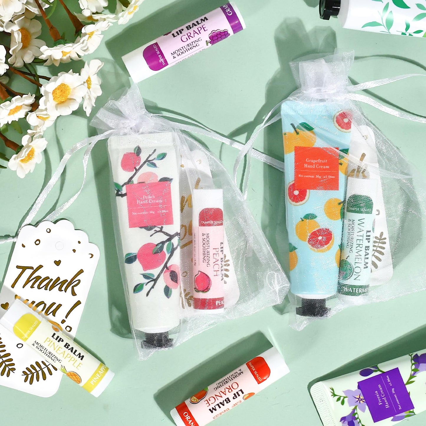 AZEN 100 Sets Bulk Gifts, Hand Cream and Lip Balm Bulk Set with Organza Bag Thank You Card, Baby Shower Wedding Gifts for Guests, Bridal Wedding Favors for Guests, Thank You Gifts for Women