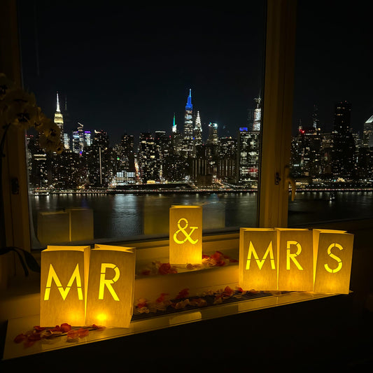 WYMM “MR & MRS” light up letters with Tealight Candles and Rose petals included. Luminary Paper Bags to be used as Wedding Decorations for Reception or as Newlywed Gift for the Honeymoon Suite