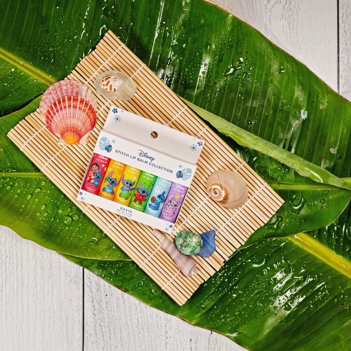 Basin Disney Stitch Lip Balm Collection | 6 Pack Tropical Flavors (Pineapple Paradise, Colada Coconut & More) | Organic Island-Inspired Gift Set, Official Disney, Made in USA