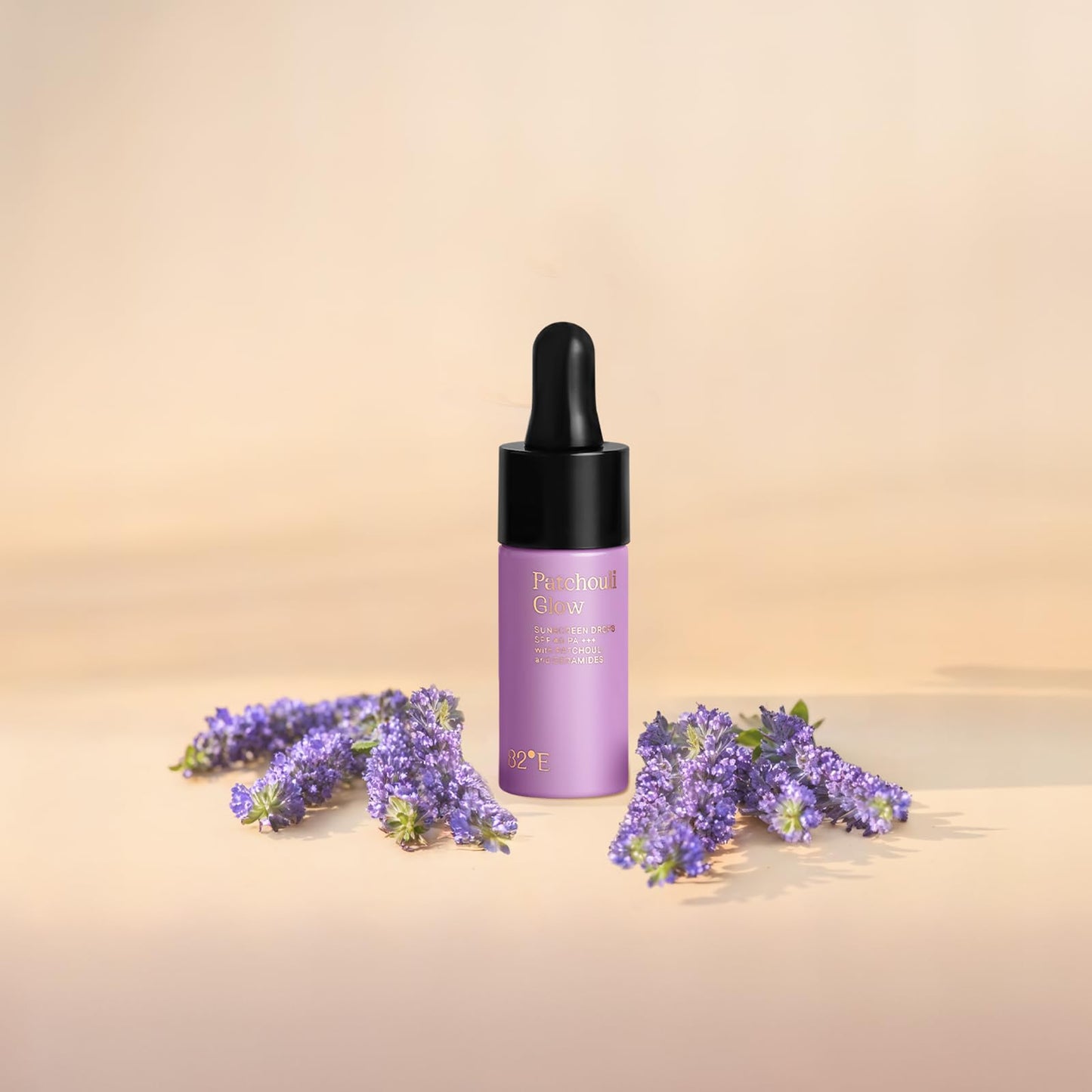 Patchouli Glow Sunscreen Drops SPF 40 PA Plus Mini by 82E for Women - 0.5 oz Sunscreen