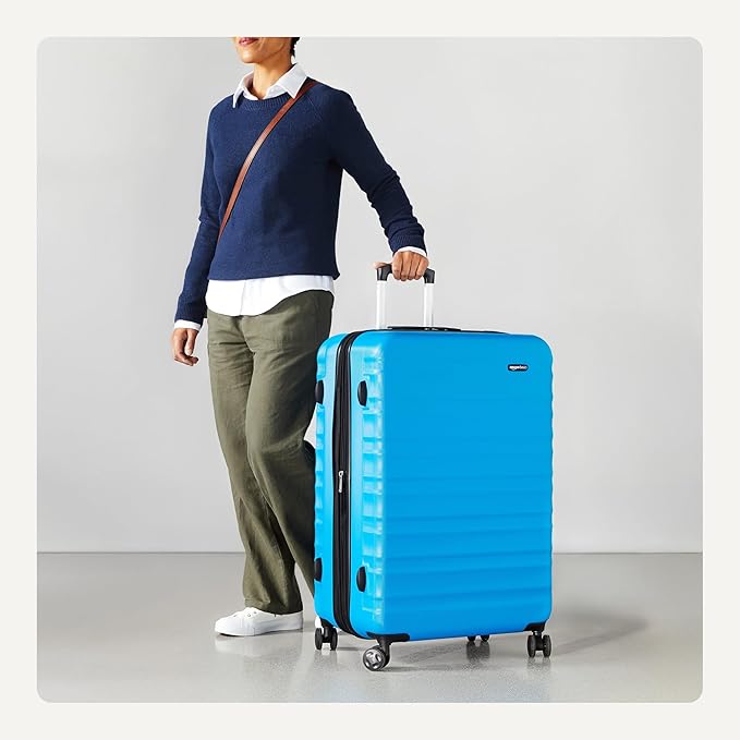 Amazon Basics 30" Hardside Large Checked Luggage, Hardshell Suitcase With Wheels, Expandable For Up to 15% More Space, With Scratch-Resistant Surface, Four Multi-directional Wheels, Light Blue