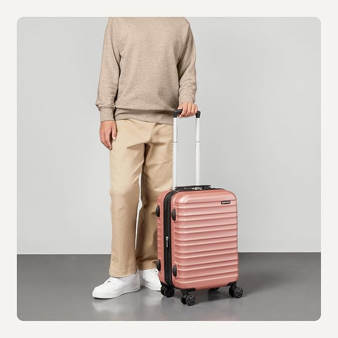 Amazon Basics 21" Hardside Carry-On Luggage, Hardshell Suitcase With Wheels, Expandable For Up to 25% More Space, With Scratch-Resistant Surface, Four Multi-directional Wheels, Rose Gold