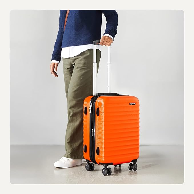 Amazon Basics 21" Hardside Carry-On Luggage, Hardshell Suitcase With Wheels, Expandable For Up to 25% More Space, With Scratch-Resistant Surface, Four Multi-directional Wheels, Orange