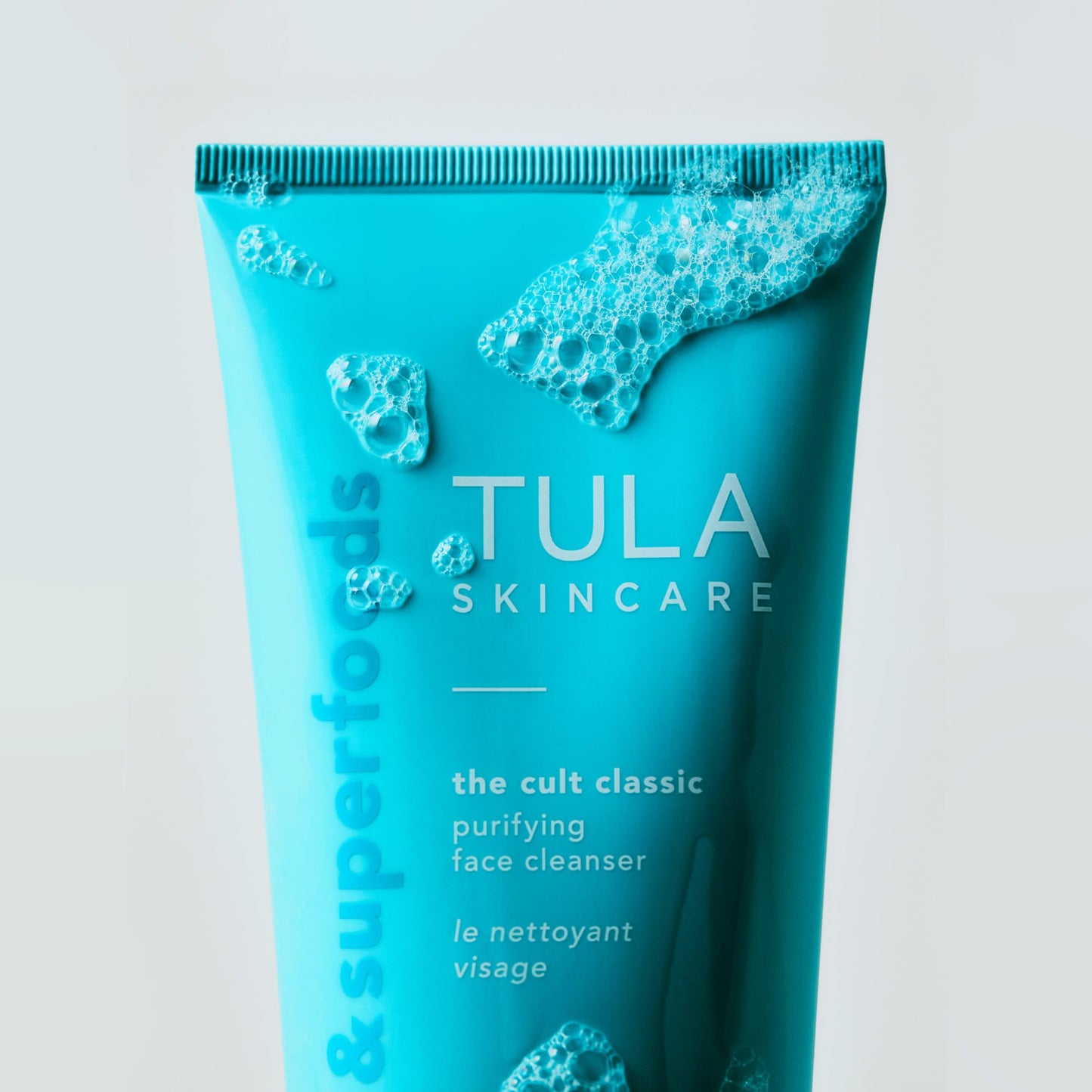 TULA Skin Care The Cult Classic Purifying Face Cleanser (Travel-Size) | Gentle and Effective Face Wash, Makeup Remover, Nourishing and Hydrating | 1.67 oz.