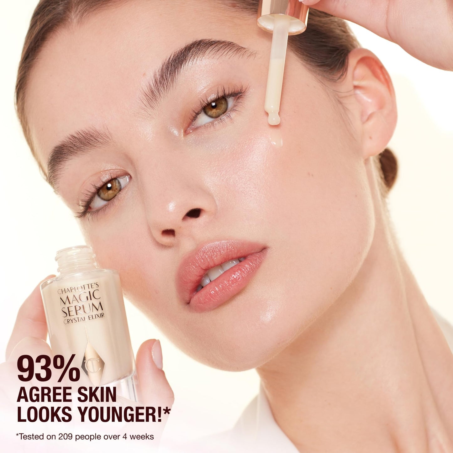 Charlotte Tilbury Magic Face Serum Crystal Elixir - Firming Peptide Serum for Face & Neck - Enriched with Plant Adaptogen Extracts to Help Boost Skin's Barrier Function & Moisture Retention (8ml)