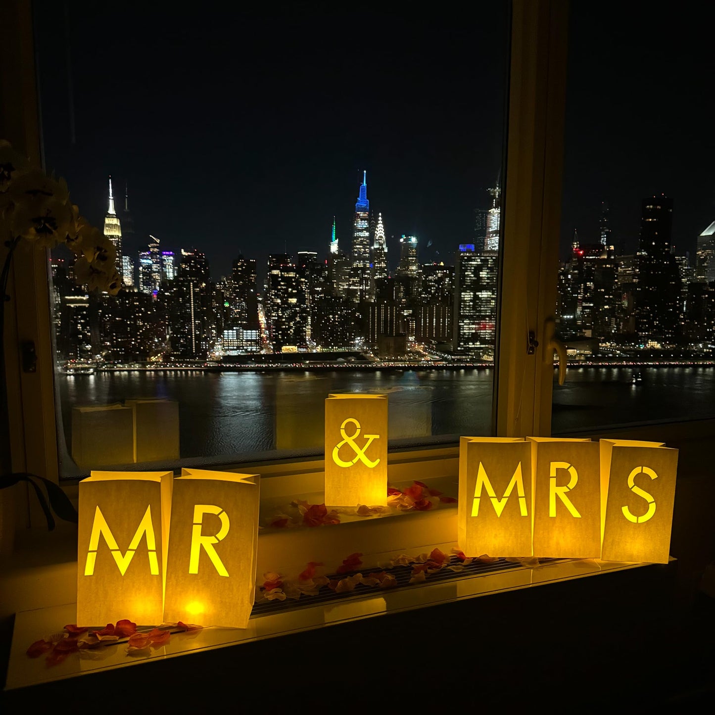 WYMM “MR & MRS” light up letters with Tealight Candles and Rose petals included. Luminary Paper Bags to be used as Wedding Decorations for Reception or as Newlywed Gift for the Honeymoon Suite