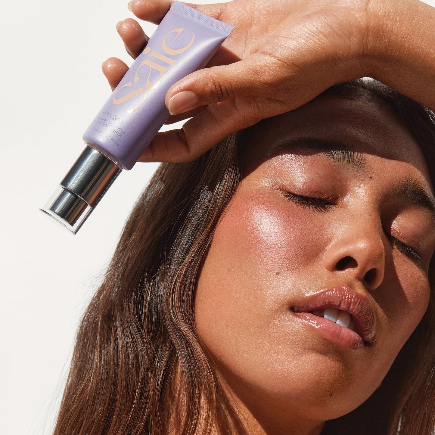 Saie Mini Sunvisor Broad Spectrum Face Sunscreen Moisturizer SPF 35 - Hydrating Daily Sunscreen with 100% Sheer Mineral Zinc Oxide, Hyaluronic Acid + Vitamin C for Radiant, Dewy Skin (0.5 fl oz)